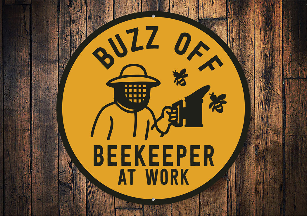 Buzz Off Beekeeper At Work Honeybee Round Sign