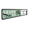 Learn To Fly Arrow Sign Aluminum Sign