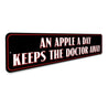 An Apple A Day Keeps The Doctor Away Sign