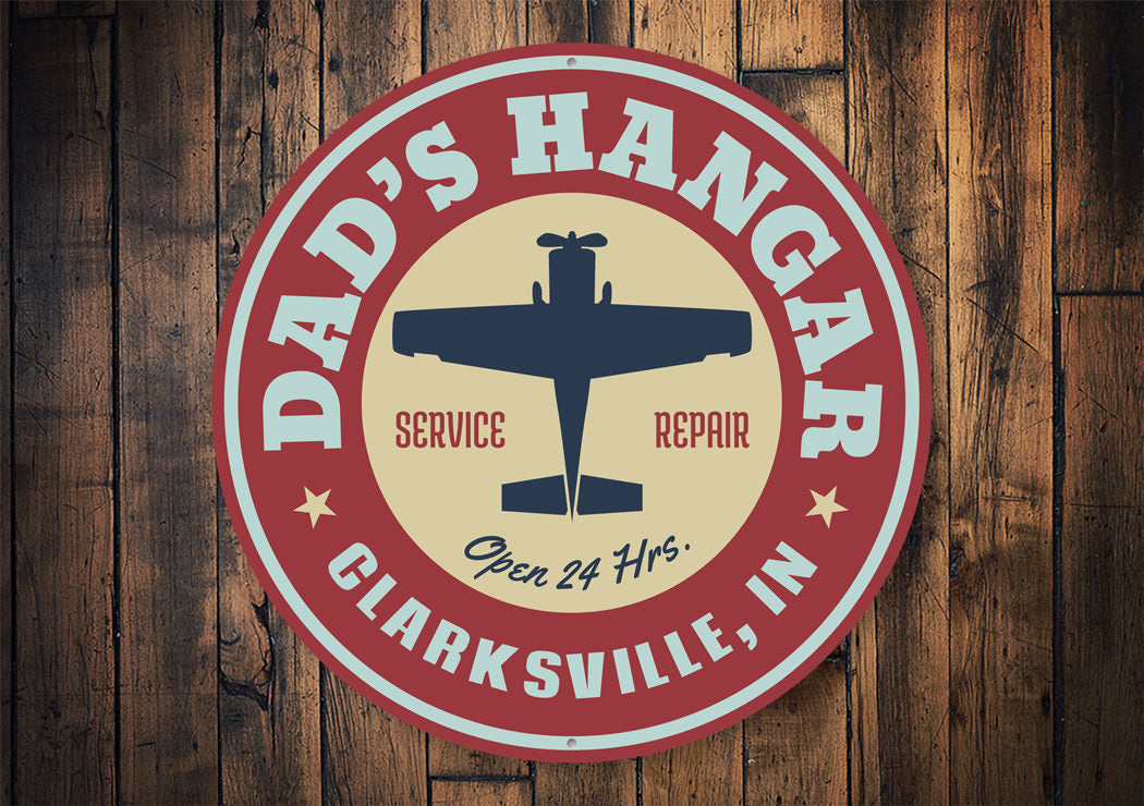 Dad's Hangar City State Sign