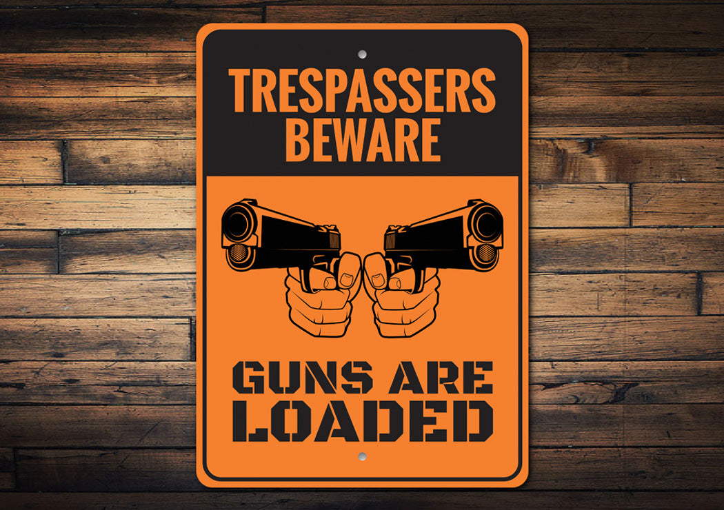 Trespassers Beware Guns are Loaded Sign