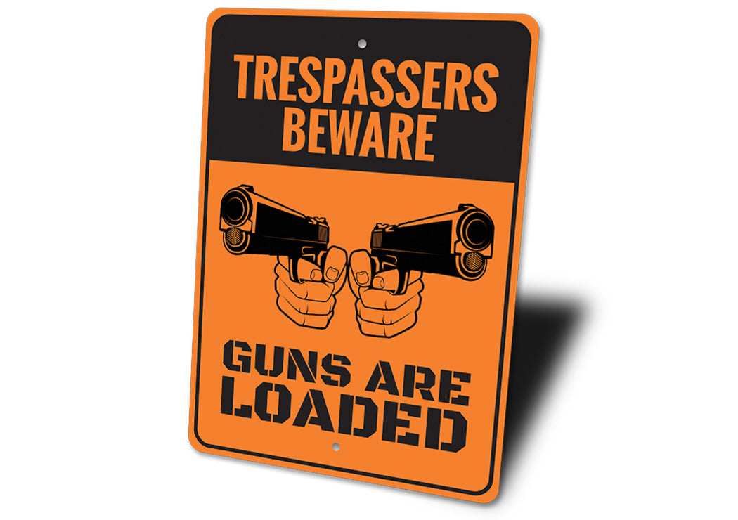 Trespassers Beware Guns are Loaded Sign