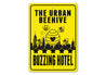 Urban Beehive Buzzing Hotel Sign