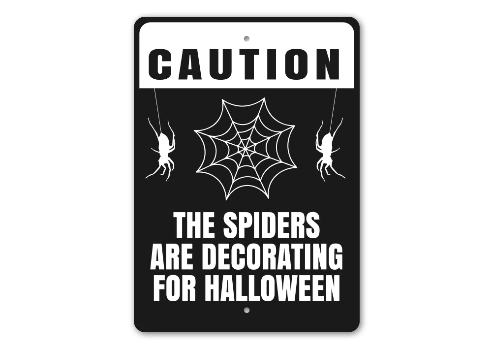 The Spiders Are Decorating For Halloween Sign